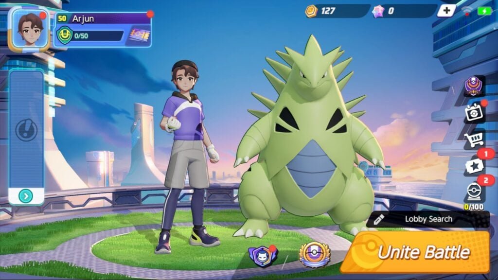 Feature image for our best Android MOBAs feature. It shows a screen from Pokémon UNITE, with a trainer stood next to a tyranitar.